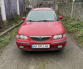 Красный Мазда 626, объемом двигателя 1.8 л и пробегом 333 тыс. км за 1700 $, фото 1 на Automoto.ua