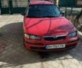 Красный Мазда 626, объемом двигателя 2 л и пробегом 40 тыс. км за 1800 $, фото 1 на Automoto.ua
