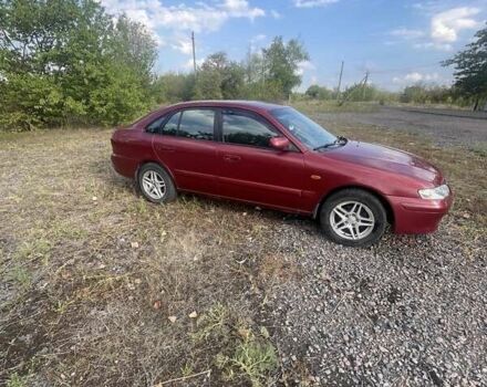 Червоний Мазда 626, об'ємом двигуна 2 л та пробігом 306 тис. км за 3200 $, фото 2 на Automoto.ua