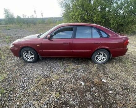 Червоний Мазда 626, об'ємом двигуна 2 л та пробігом 306 тис. км за 3200 $, фото 1 на Automoto.ua