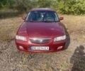 Червоний Мазда 626, об'ємом двигуна 2 л та пробігом 306 тис. км за 3200 $, фото 6 на Automoto.ua