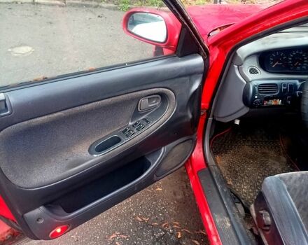 Красный Мазда 626, объемом двигателя 2 л и пробегом 247 тыс. км за 940 $, фото 5 на Automoto.ua