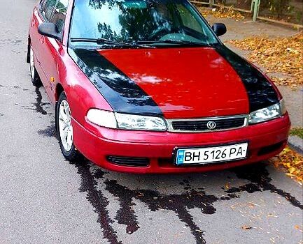 Красный Мазда 626, объемом двигателя 2 л и пробегом 320 тыс. км за 1500 $, фото 4 на Automoto.ua