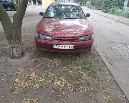 Красный Мазда 626, объемом двигателя 1.8 л и пробегом 270 тыс. км за 1350 $, фото 1 на Automoto.ua