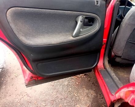 Красный Мазда 626, объемом двигателя 2 л и пробегом 247 тыс. км за 940 $, фото 2 на Automoto.ua