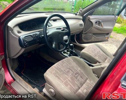 Красный Мазда 626, объемом двигателя 2 л и пробегом 308 тыс. км за 1600 $, фото 2 на Automoto.ua