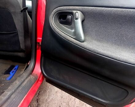 Красный Мазда 626, объемом двигателя 2 л и пробегом 247 тыс. км за 940 $, фото 4 на Automoto.ua