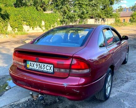 Красный Мазда 626, объемом двигателя 1.8 л и пробегом 0 тыс. км за 1800 $, фото 2 на Automoto.ua