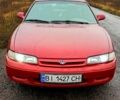 Красный Мазда 626, объемом двигателя 1.8 л и пробегом 33 тыс. км за 1500 $, фото 1 на Automoto.ua