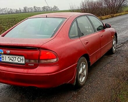 Красный Мазда 626, объемом двигателя 1.8 л и пробегом 33 тыс. км за 1500 $, фото 2 на Automoto.ua