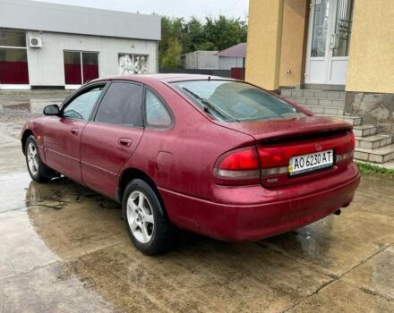 Красный Мазда 626, объемом двигателя 1.8 л и пробегом 200 тыс. км за 1200 $, фото 1 на Automoto.ua