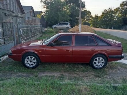 Червоний Мазда 626, об'ємом двигуна 2 л та пробігом 1000 тис. км за 1650 $, фото 1 на Automoto.ua