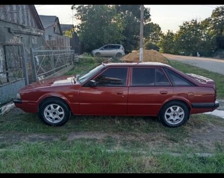 Красный Мазда 626, объемом двигателя 2 л и пробегом 1000 тыс. км за 1650 $, фото 1 на Automoto.ua