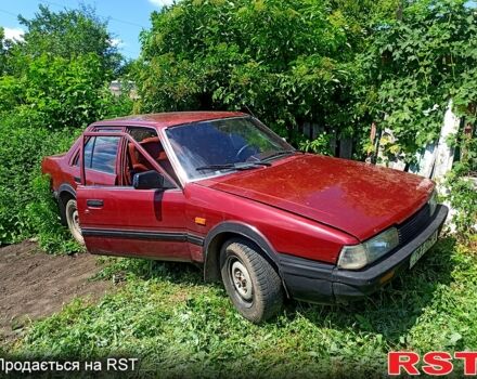 Красный Мазда 626, объемом двигателя 2 л и пробегом 300 тыс. км за 500 $, фото 1 на Automoto.ua