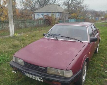 Красный Мазда 626, объемом двигателя 2 л и пробегом 300 тыс. км за 1000 $, фото 1 на Automoto.ua