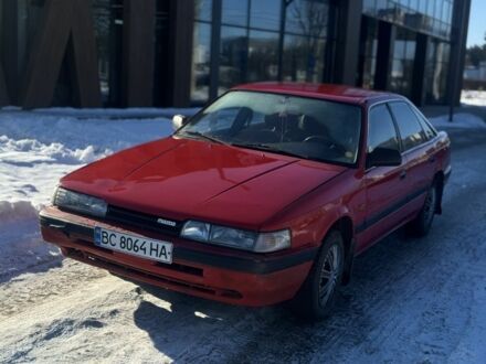 Червоний Мазда 626, об'ємом двигуна 2 л та пробігом 210 тис. км за 999 $, фото 1 на Automoto.ua