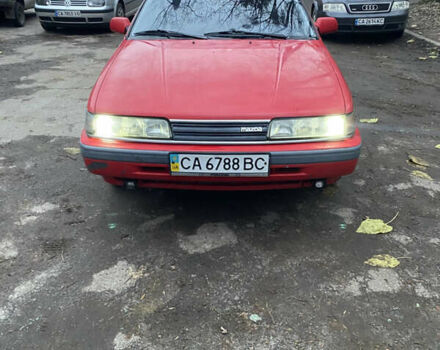 Красный Мазда 626, объемом двигателя 1.8 л и пробегом 324 тыс. км за 1650 $, фото 1 на Automoto.ua