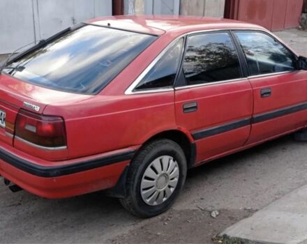 Красный Мазда 626, объемом двигателя 2 л и пробегом 373 тыс. км за 1350 $, фото 1 на Automoto.ua