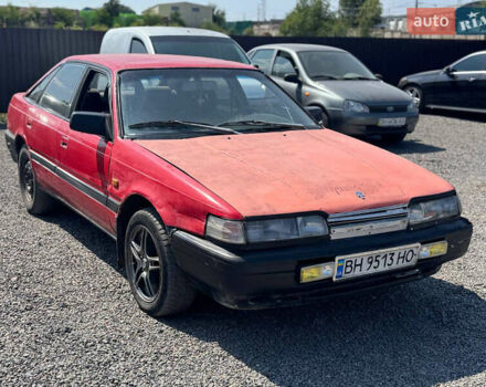 Красный Мазда 626, объемом двигателя 1.8 л и пробегом 300 тыс. км за 650 $, фото 1 на Automoto.ua