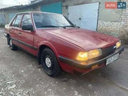 Красный Мазда 626, объемом двигателя 2 л и пробегом 250 тыс. км за 1000 $, фото 1 на Automoto.ua
