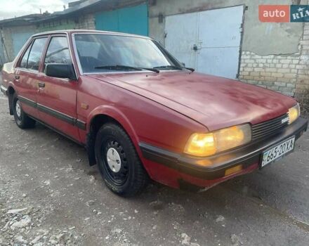 Красный Мазда 626, объемом двигателя 2 л и пробегом 250 тыс. км за 1000 $, фото 1 на Automoto.ua