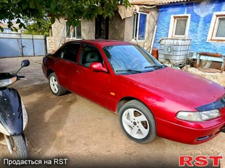 Червоний Мазда 626, об'ємом двигуна 2 л та пробігом 387 тис. км за 1400 $, фото 1 на Automoto.ua