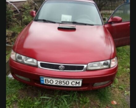 Красный Мазда 626, объемом двигателя 2 л и пробегом 360 тыс. км за 2000 $, фото 1 на Automoto.ua