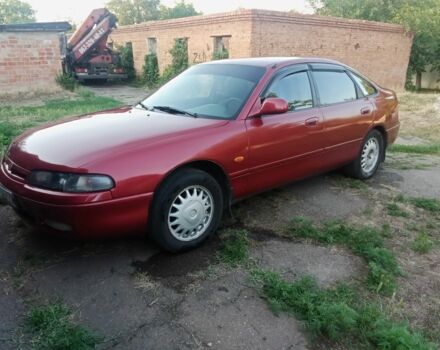 Красный Мазда 626, объемом двигателя 2 л и пробегом 350 тыс. км за 1999 $, фото 1 на Automoto.ua