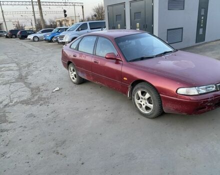 Красный Мазда 626, объемом двигателя 2 л и пробегом 300 тыс. км за 1200 $, фото 1 на Automoto.ua