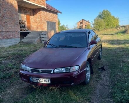 Красный Мазда 626, объемом двигателя 2 л и пробегом 300 тыс. км за 800 $, фото 1 на Automoto.ua