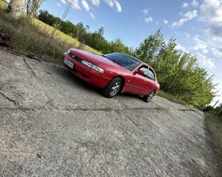 Красный Мазда 626, объемом двигателя 2 л и пробегом 220 тыс. км за 2000 $, фото 1 на Automoto.ua