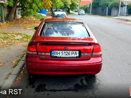 Червоний Мазда 626, об'ємом двигуна 2 л та пробігом 320 тис. км за 1500 $, фото 1 на Automoto.ua