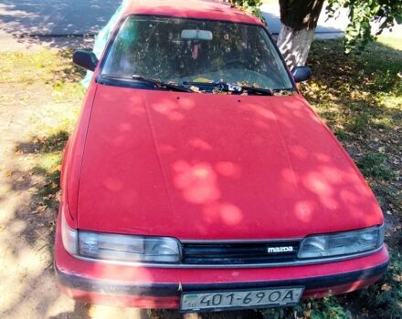 Красный Мазда 626, объемом двигателя 2 л и пробегом 250 тыс. км за 804 $, фото 1 на Automoto.ua