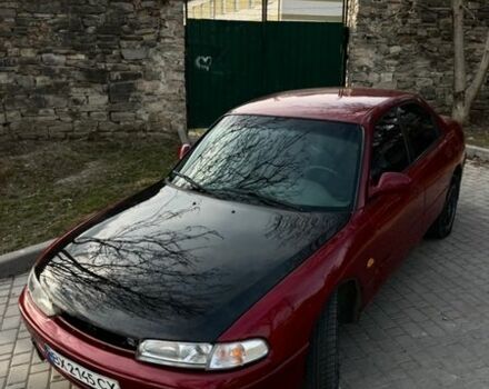 Красный Мазда 626, объемом двигателя 2 л и пробегом 305 тыс. км за 2399 $, фото 1 на Automoto.ua