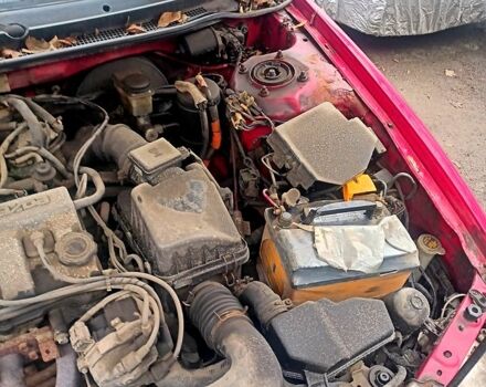 Красный Мазда 626, объемом двигателя 2 л и пробегом 247 тыс. км за 940 $, фото 1 на Automoto.ua