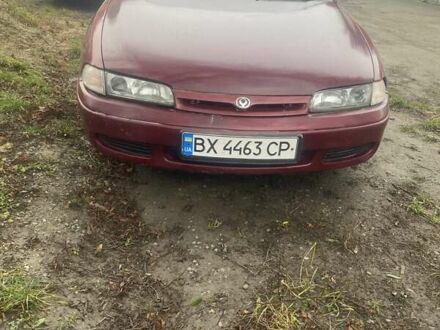 Красный Мазда 626, объемом двигателя 2 л и пробегом 300 тыс. км за 1350 $, фото 1 на Automoto.ua