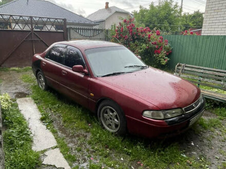 Красный Мазда 626, объемом двигателя 2 л и пробегом 500 тыс. км за 1500 $, фото 1 на Automoto.ua