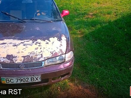 Червоний Мазда 626, об'ємом двигуна 2 л та пробігом 285 тис. км за 750 $, фото 1 на Automoto.ua