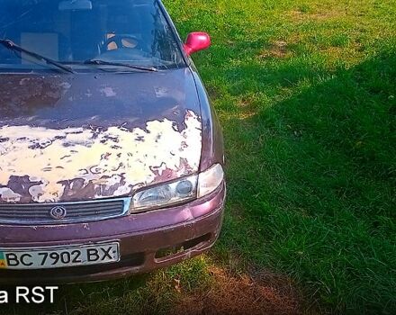 Красный Мазда 626, объемом двигателя 2 л и пробегом 285 тыс. км за 750 $, фото 1 на Automoto.ua