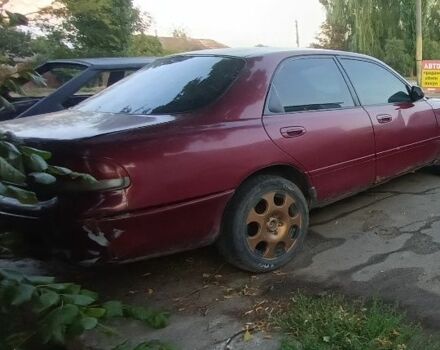Красный Мазда 626, объемом двигателя 2 л и пробегом 1000 тыс. км за 486 $, фото 1 на Automoto.ua