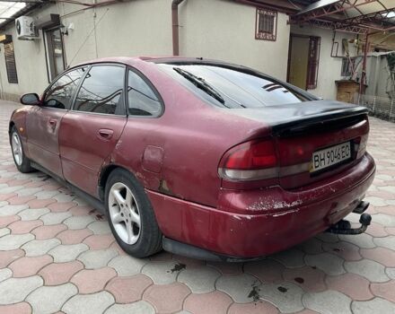 Червоний Мазда 626, об'ємом двигуна 2 л та пробігом 33 тис. км за 1300 $, фото 1 на Automoto.ua