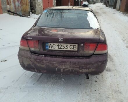 Червоний Мазда 626, об'ємом двигуна 2 л та пробігом 50 тис. км за 473 $, фото 1 на Automoto.ua