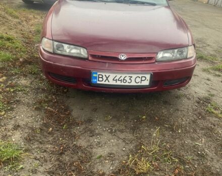 Красный Мазда 626, объемом двигателя 2 л и пробегом 300 тыс. км за 1350 $, фото 1 на Automoto.ua