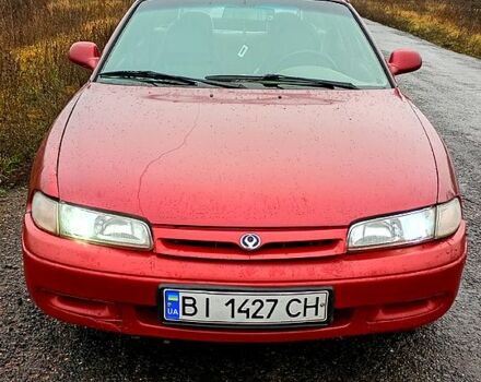 Красный Мазда 626, объемом двигателя 1.8 л и пробегом 33 тыс. км за 1500 $, фото 1 на Automoto.ua