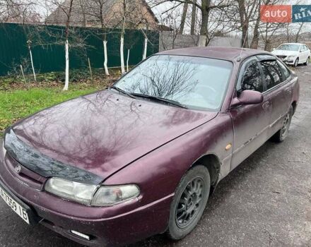 Красный Мазда 626, объемом двигателя 2 л и пробегом 413 тыс. км за 1500 $, фото 1 на Automoto.ua