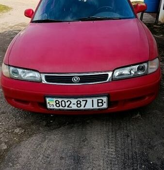 Красный Мазда 626, объемом двигателя 2 л и пробегом 330 тыс. км за 998 $, фото 1 на Automoto.ua