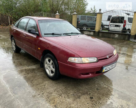 Красный Мазда 626, объемом двигателя 1.8 л и пробегом 200 тыс. км за 1200 $, фото 1 на Automoto.ua