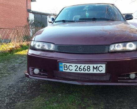 Красный Мазда 626, объемом двигателя 1.8 л и пробегом 300 тыс. км за 1700 $, фото 1 на Automoto.ua