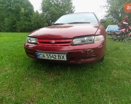 Красный Мазда 626, объемом двигателя 1.79 л и пробегом 370 тыс. км за 2200 $, фото 1 на Automoto.ua