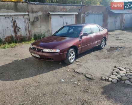 Красный Мазда 626, объемом двигателя 2 л и пробегом 390 тыс. км за 1400 $, фото 1 на Automoto.ua